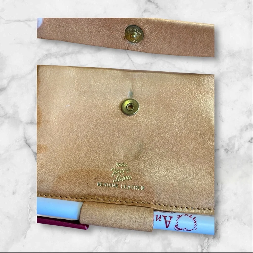 Leather billfold with check and pen spot